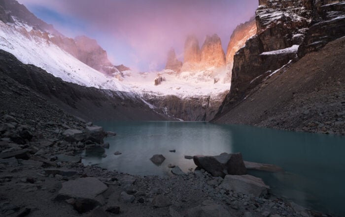 View of the Base Torres as Sunrise Hike with the first warm light of the day lighting the towers.