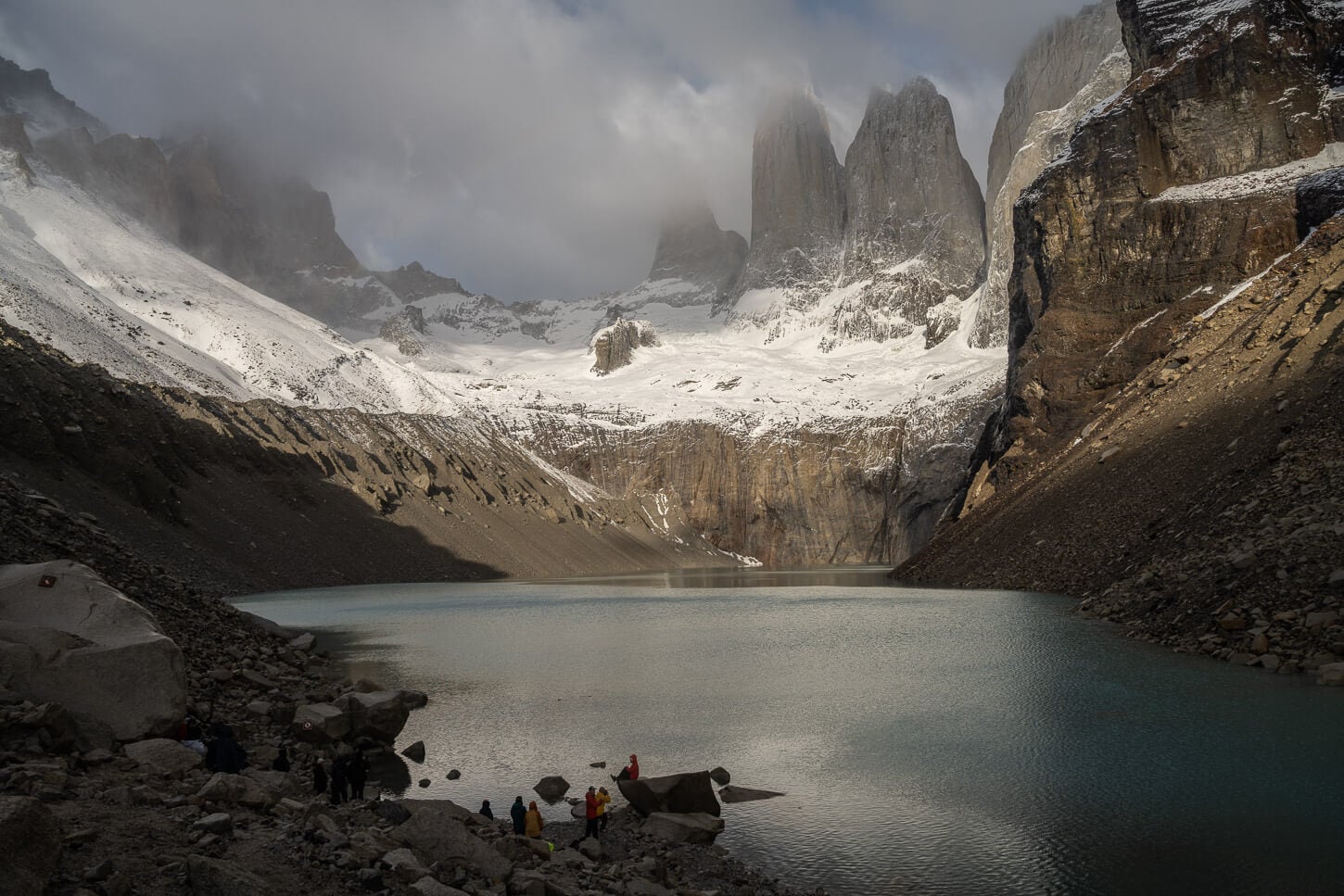 View of Mirador Base Torres with hikers enjoying the landscape.