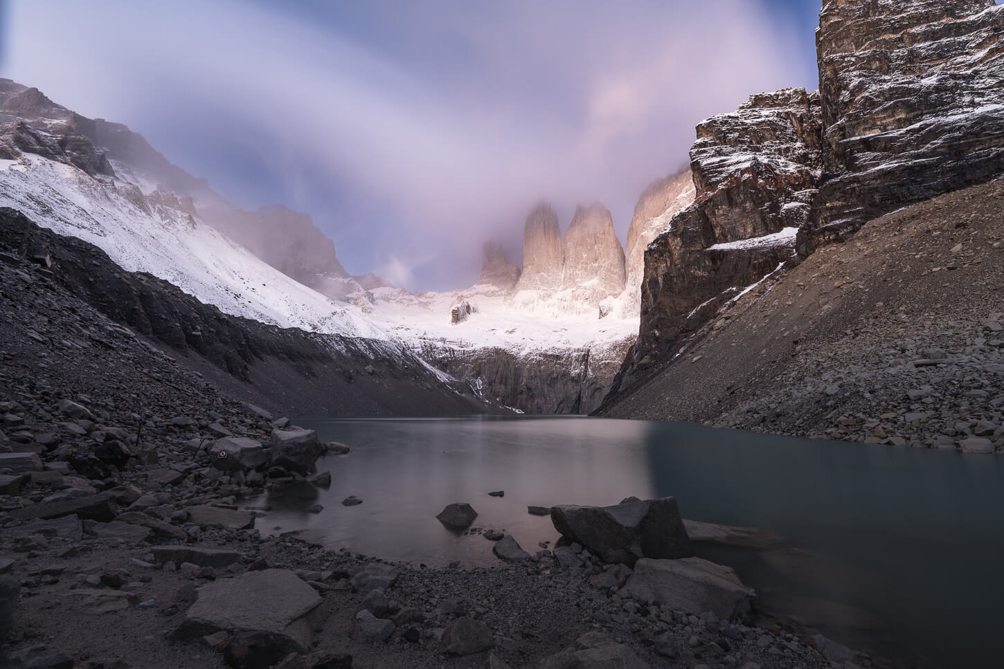 Long exposure photo of the Base Torres before sunrise.