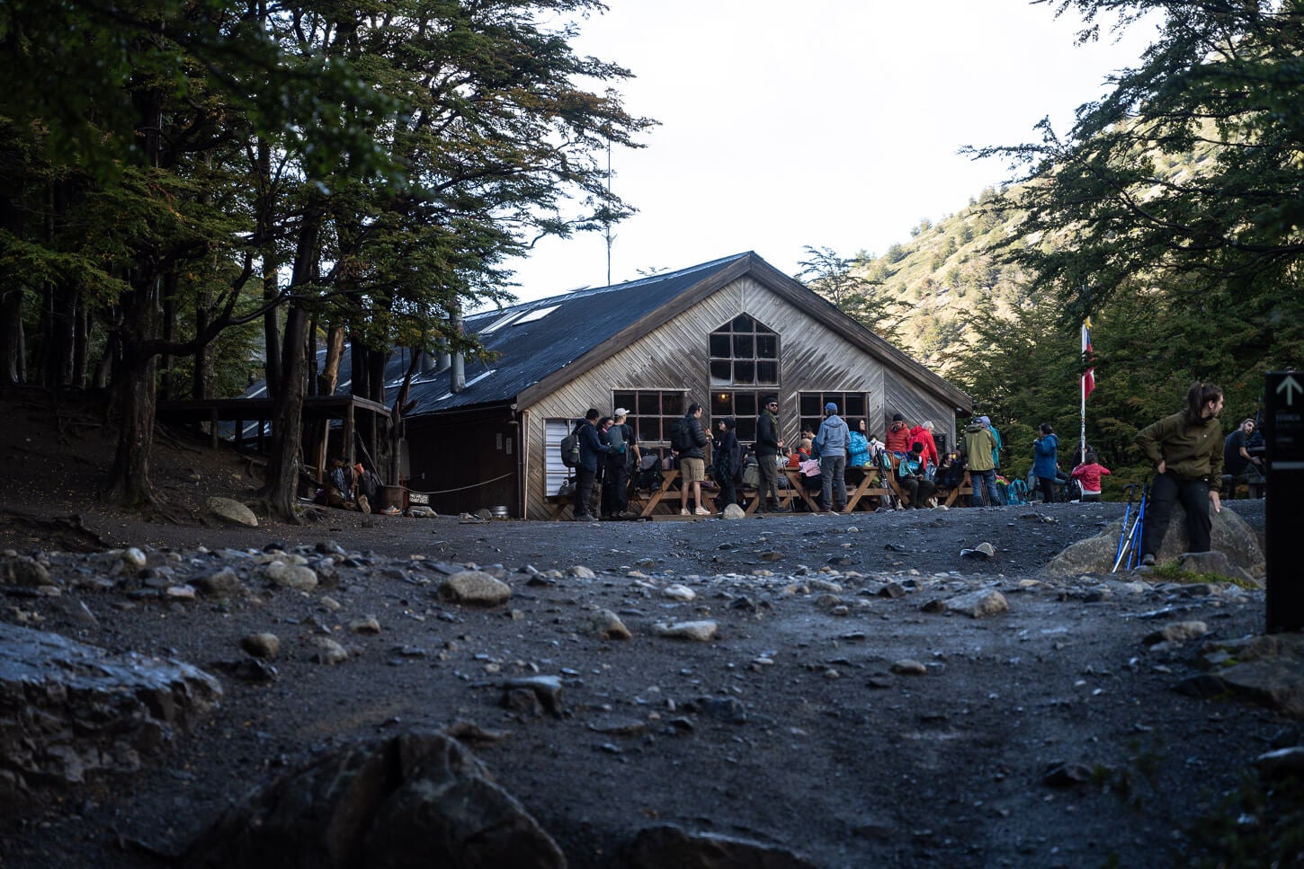 Refugio Chileno in Torres del Paine with hikers enjoying a break.