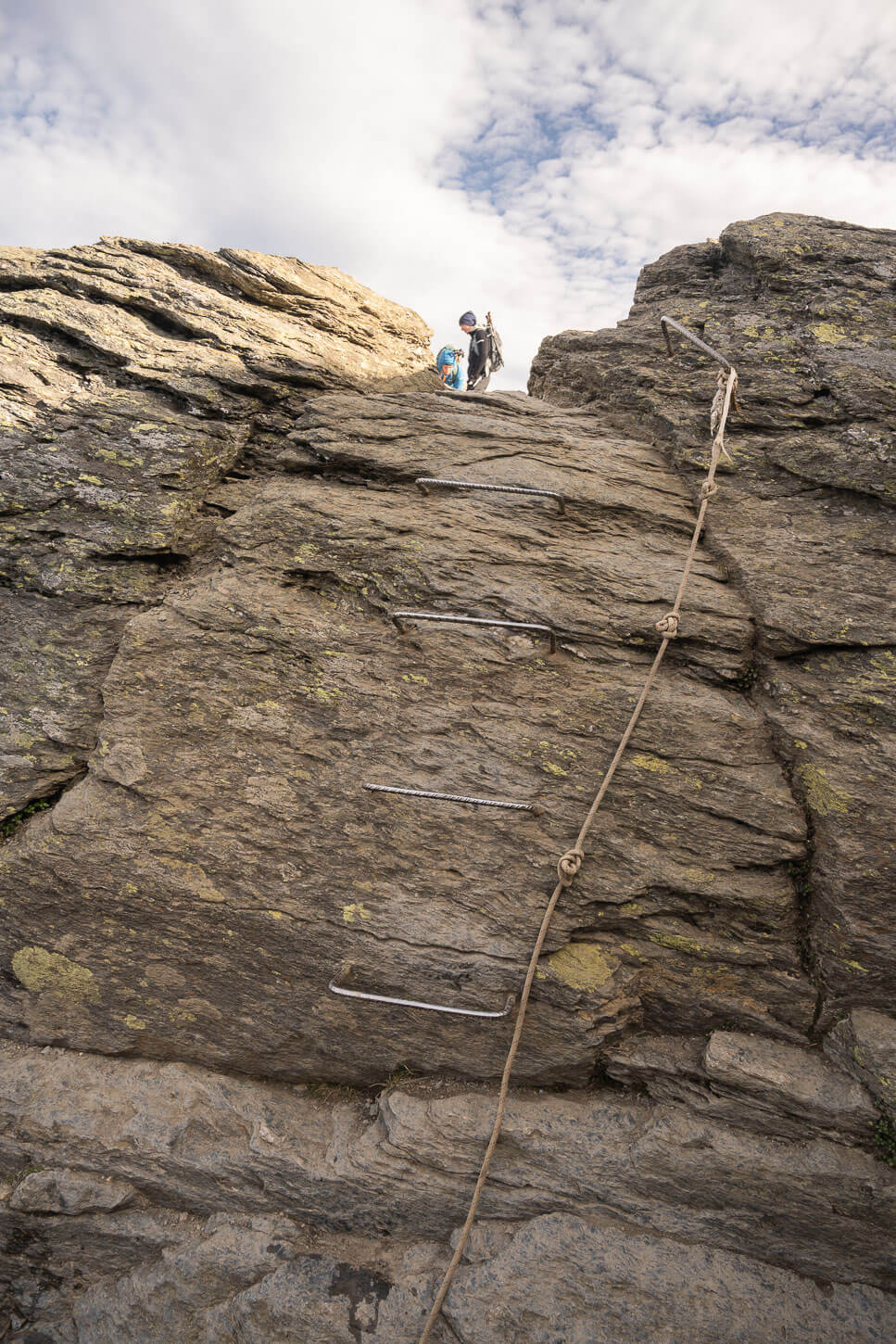 Trolltunga access point and ladder bolted into the rock