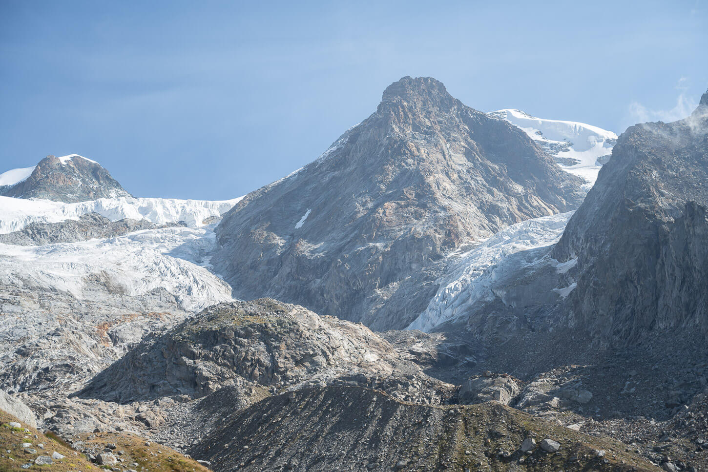 Glaciers in the Monte rosa Massif under a clear blue sky.