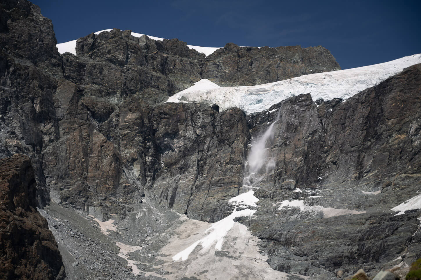 Small calving episode with collapsing, crushed ice that look like an icefall.