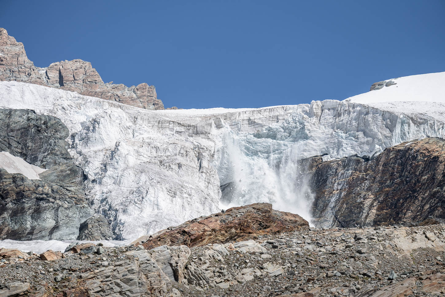 small calving epoxide in a glacier front on monte rosa above Rifugio Mezzalama.