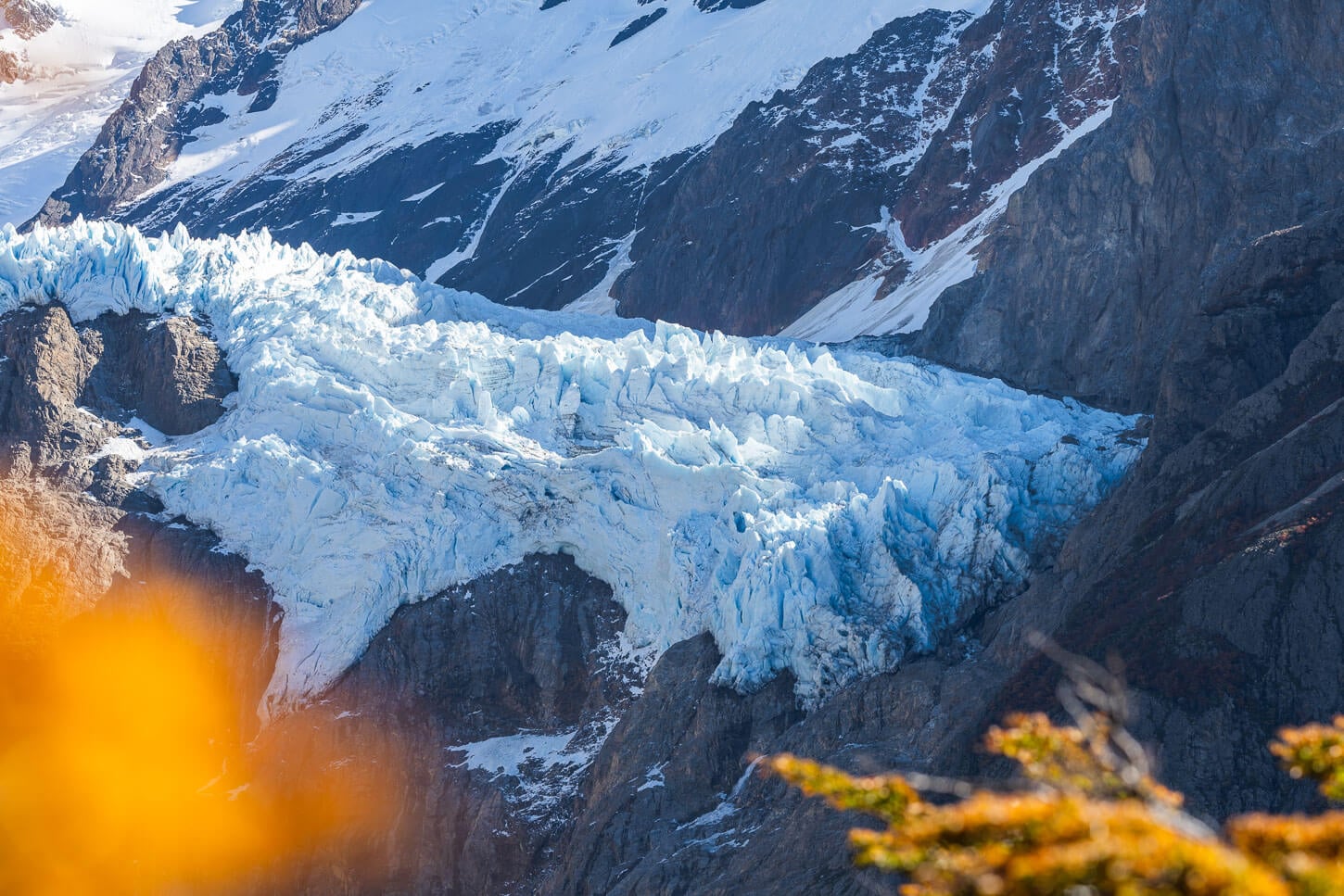 Details of the Piedras Blancas Glacier in Los Glaciares, with the chunks of ice perched atop a rockface