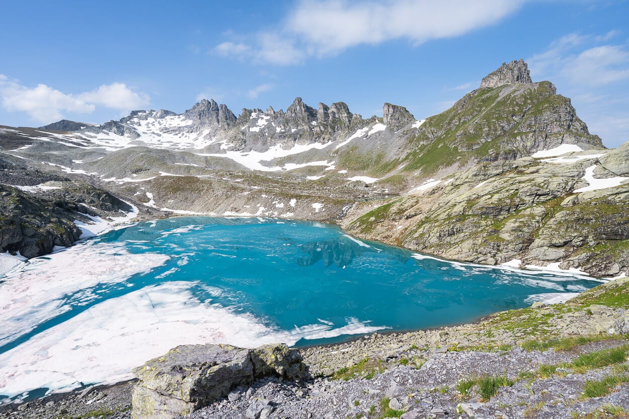 Alpine lake in Switzerland on the Pizol five lakes trail, with turquoise waters.