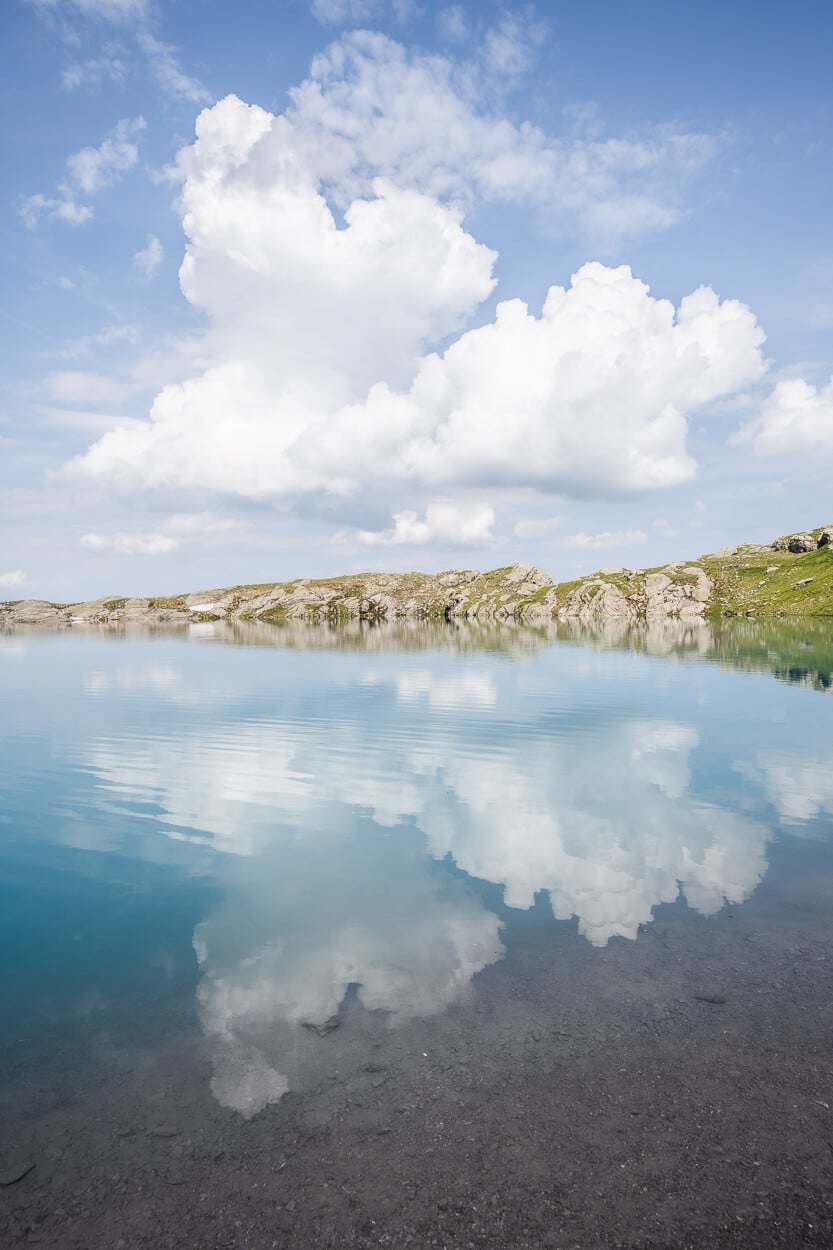 Clouds reflecting in Schottensee, forming an almost abstract scene