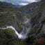 Moody image of Vøringsfossen in a photo taken from the main viewpoint along the hike on the new walkway around the waterfall.