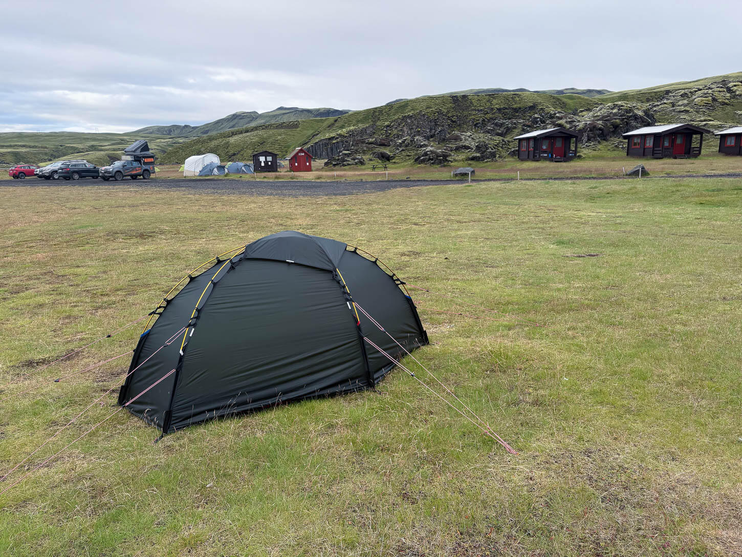 Hilleberg Soulo pitched on a grassy filed at a campsite in Iceland.