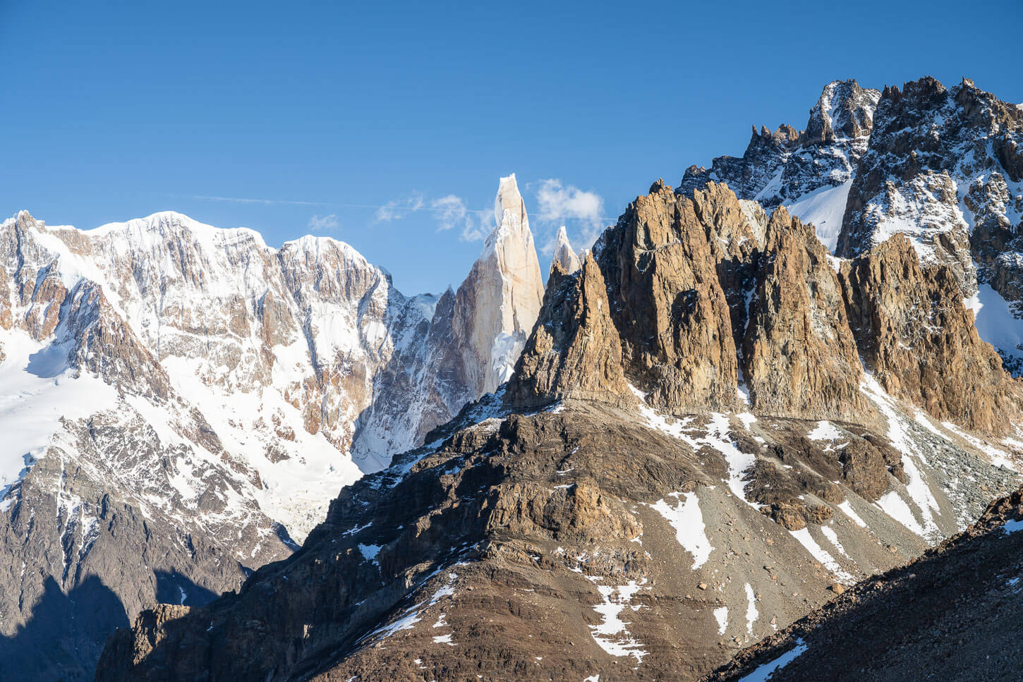 View of Cerro Torre among several jagged peaks.
