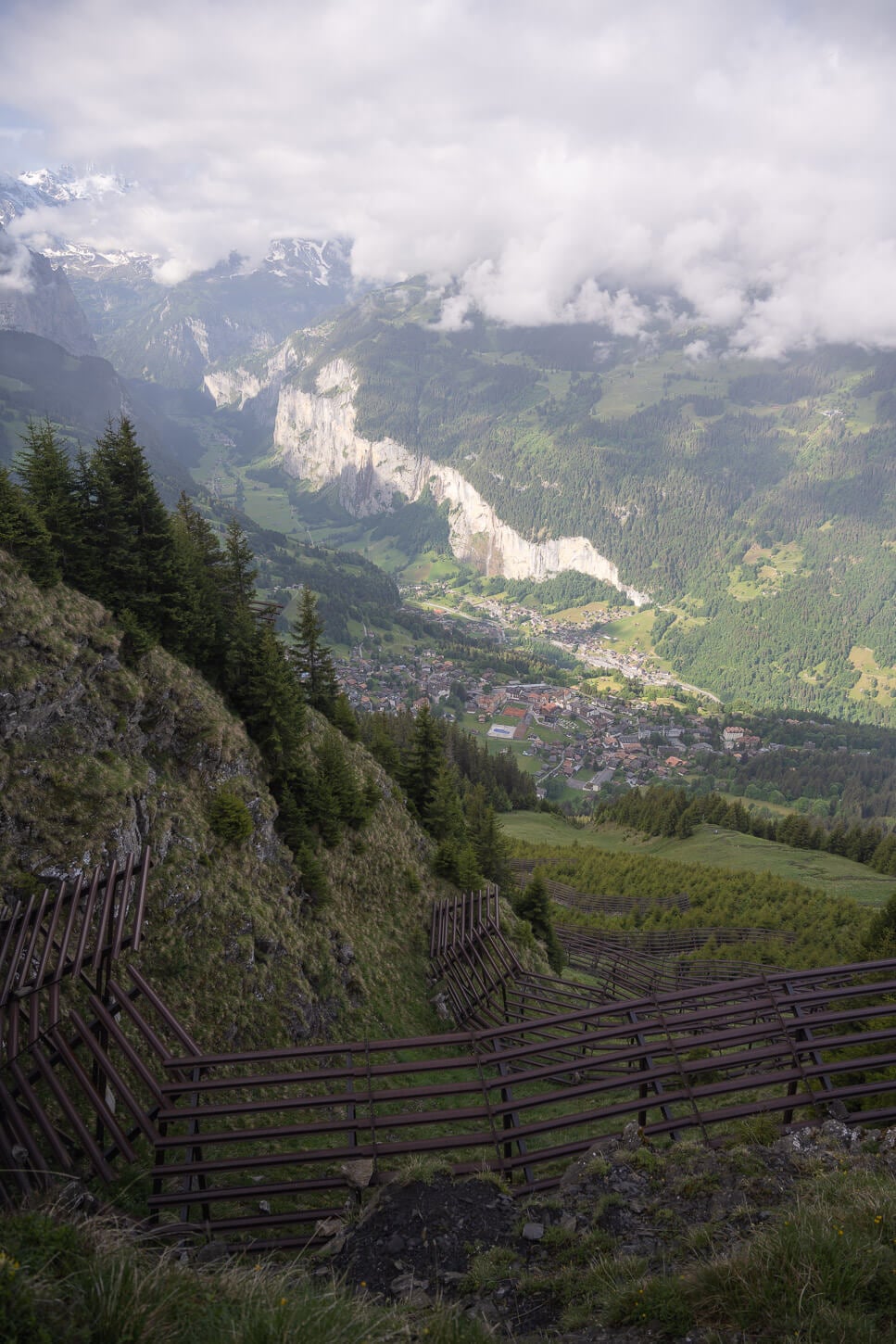 Avalanche barriers above Wengen and Lauterbrunnen, where the mountain is so steep the two town look like one.