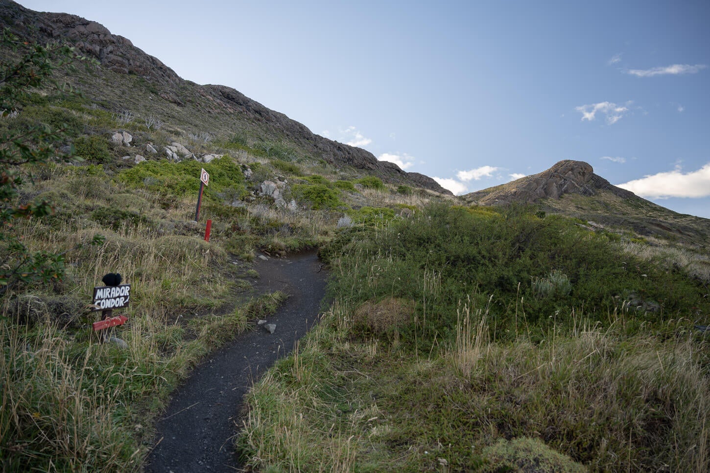 Mirador Condor trailhead, with the trail meandering up the mountain, and the mirador visible on the upper right.