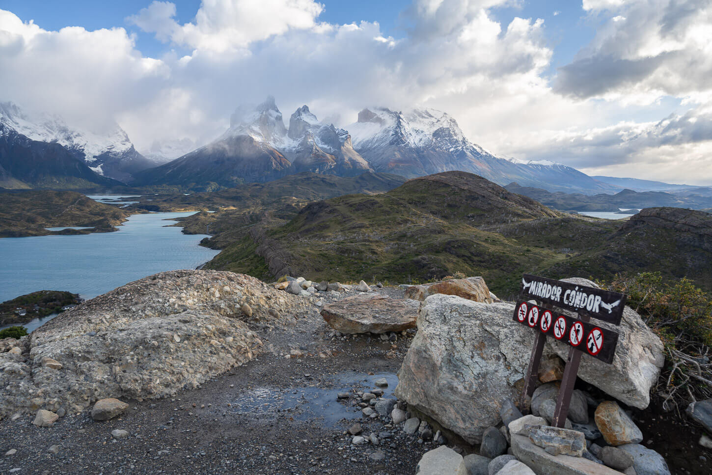 Mirador Condor, summit of the mountain with a sign marking the place, above the spectacular panoramic view.