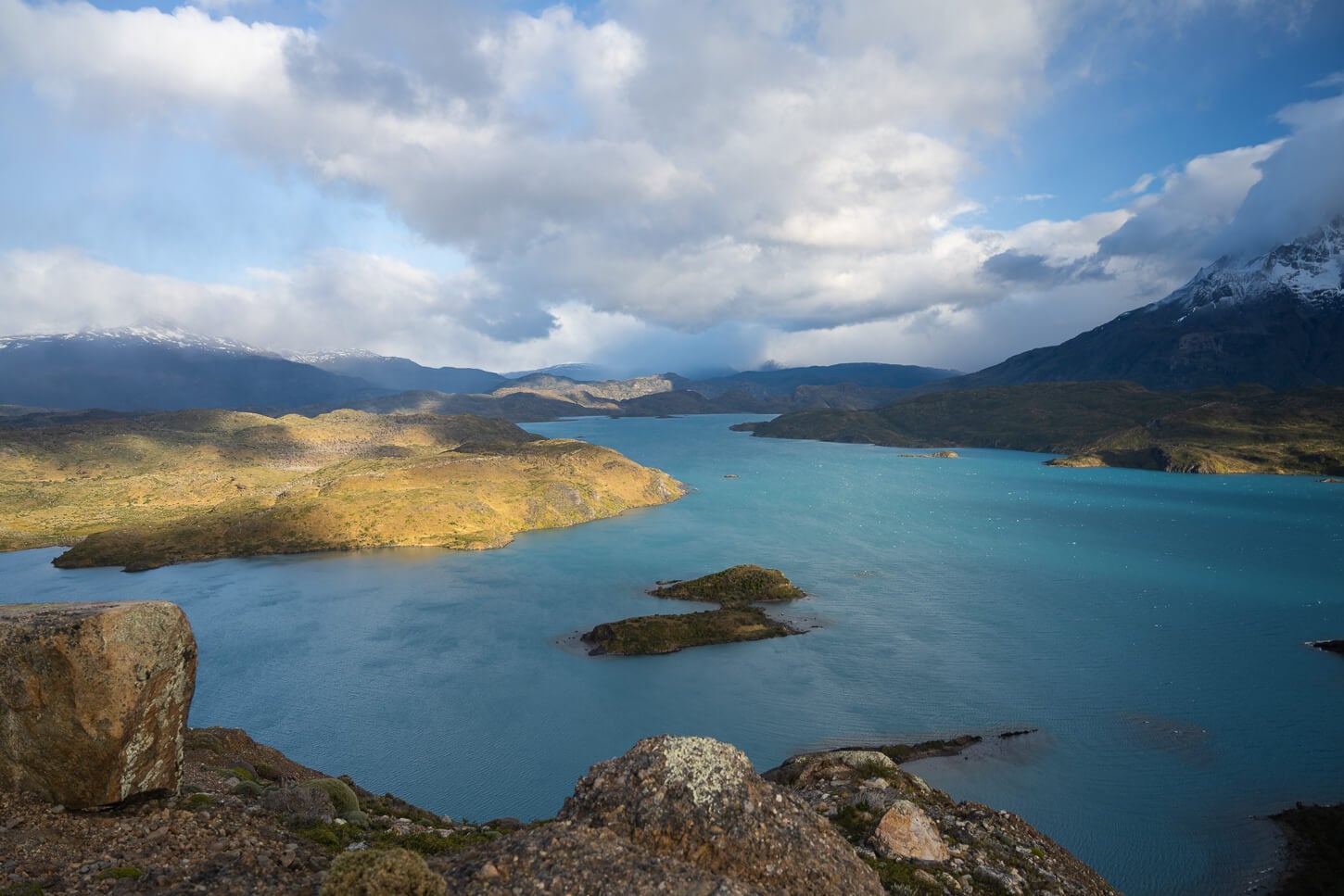 Blue waters of Lake Pehoé in the early morning.