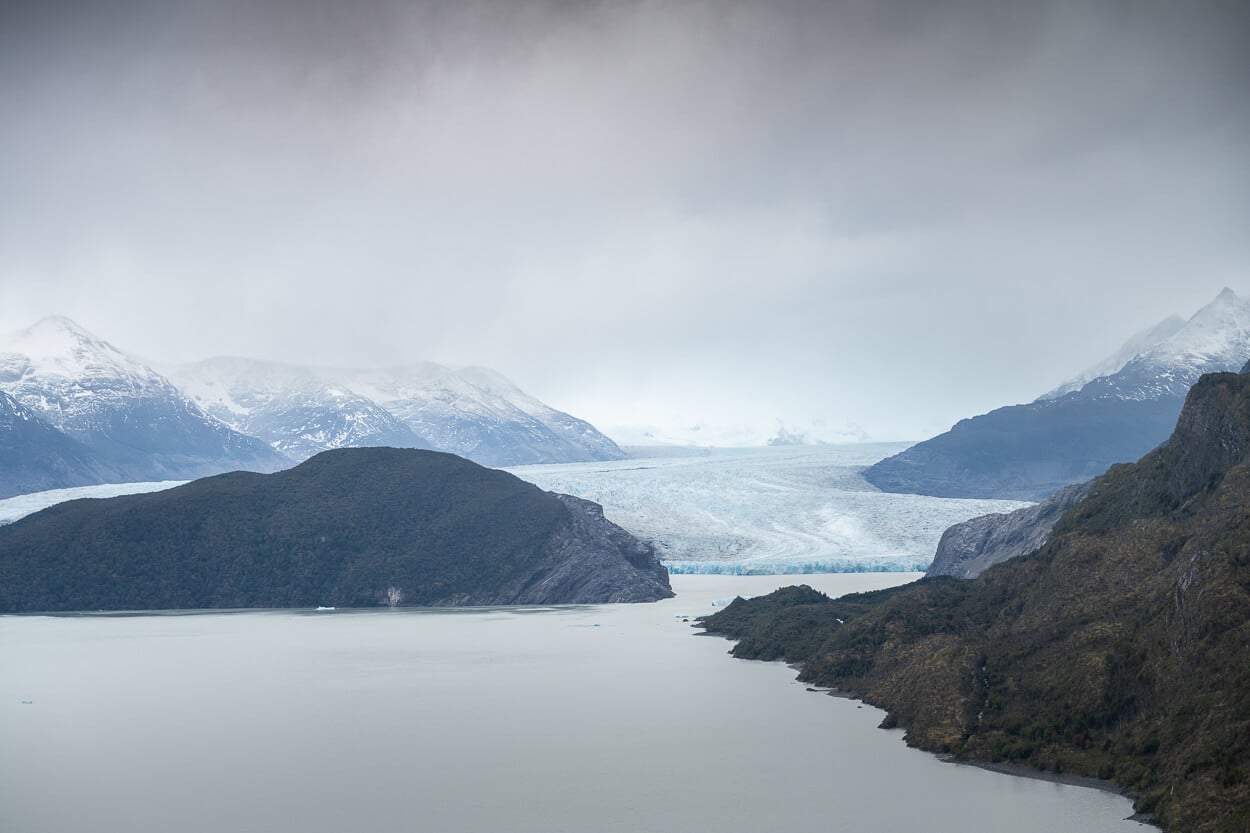 View of Glacier Grey from Mirador Grey, on an overcast day with a moody atmosphere.