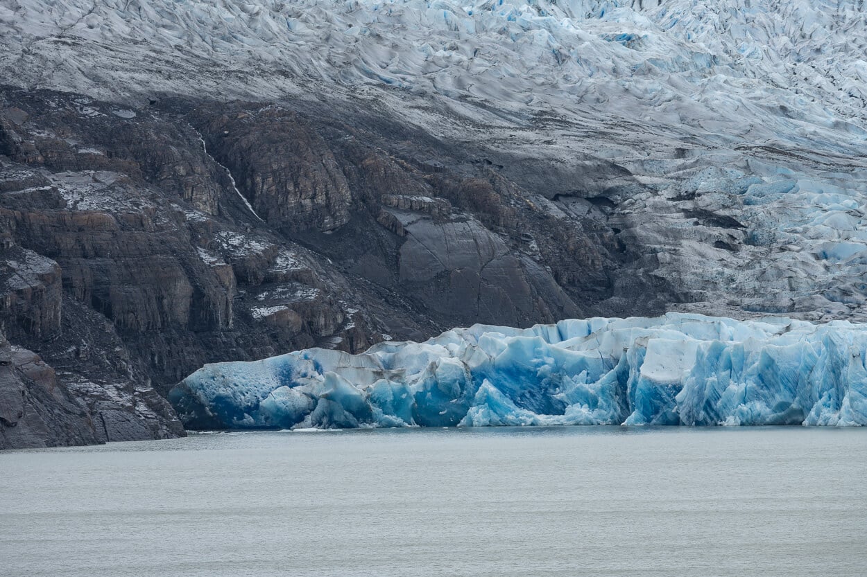 Detail of glacier grey, where the ice seemingly clings onto the rocks.