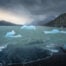 Icebergs in Lago Grey under a dramatic sky, photographed during a hike to Mirador de los Hielos