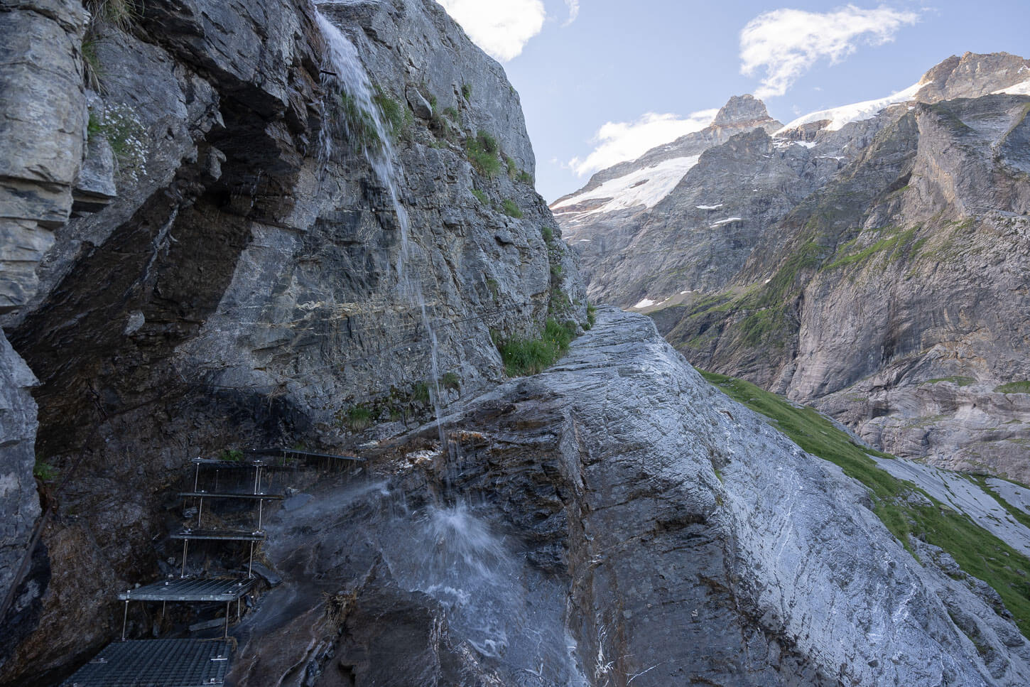 Waterfall on the trail to Glecksteinhütte you have to hike under to pass through.