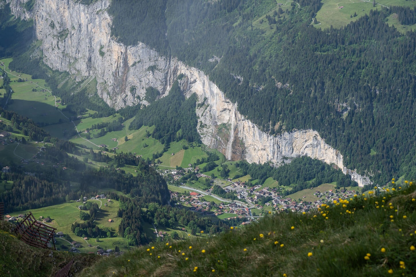 The waterfall Staubbachfall viewed from Männlichen on a sunny summer day.
