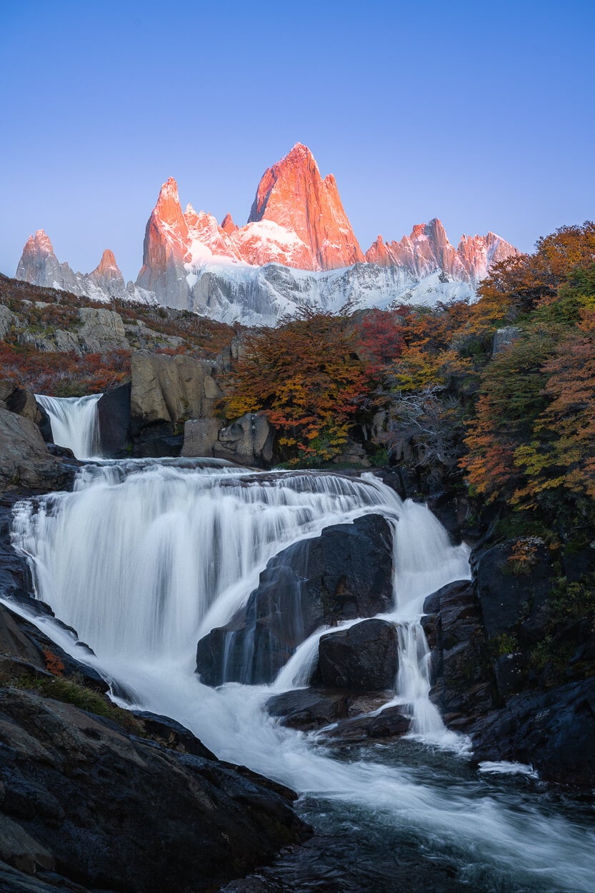 The Hidden Waterfall in El Chalten at tunrise, with Fitz Roy catching the sunrise light