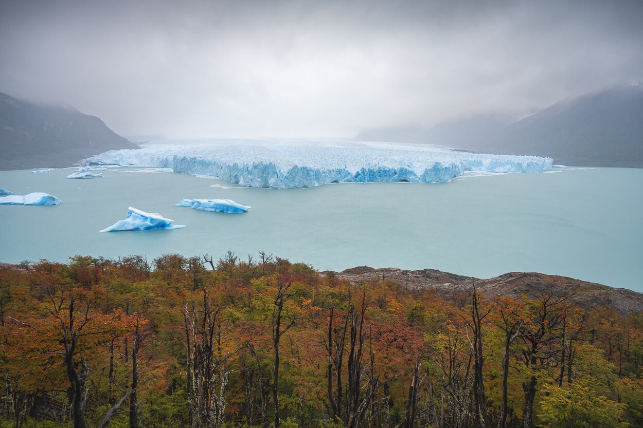 Perito Moreno Glacier in Autumn under a cloudy sky, one of the most popular points of interest in Argentina.