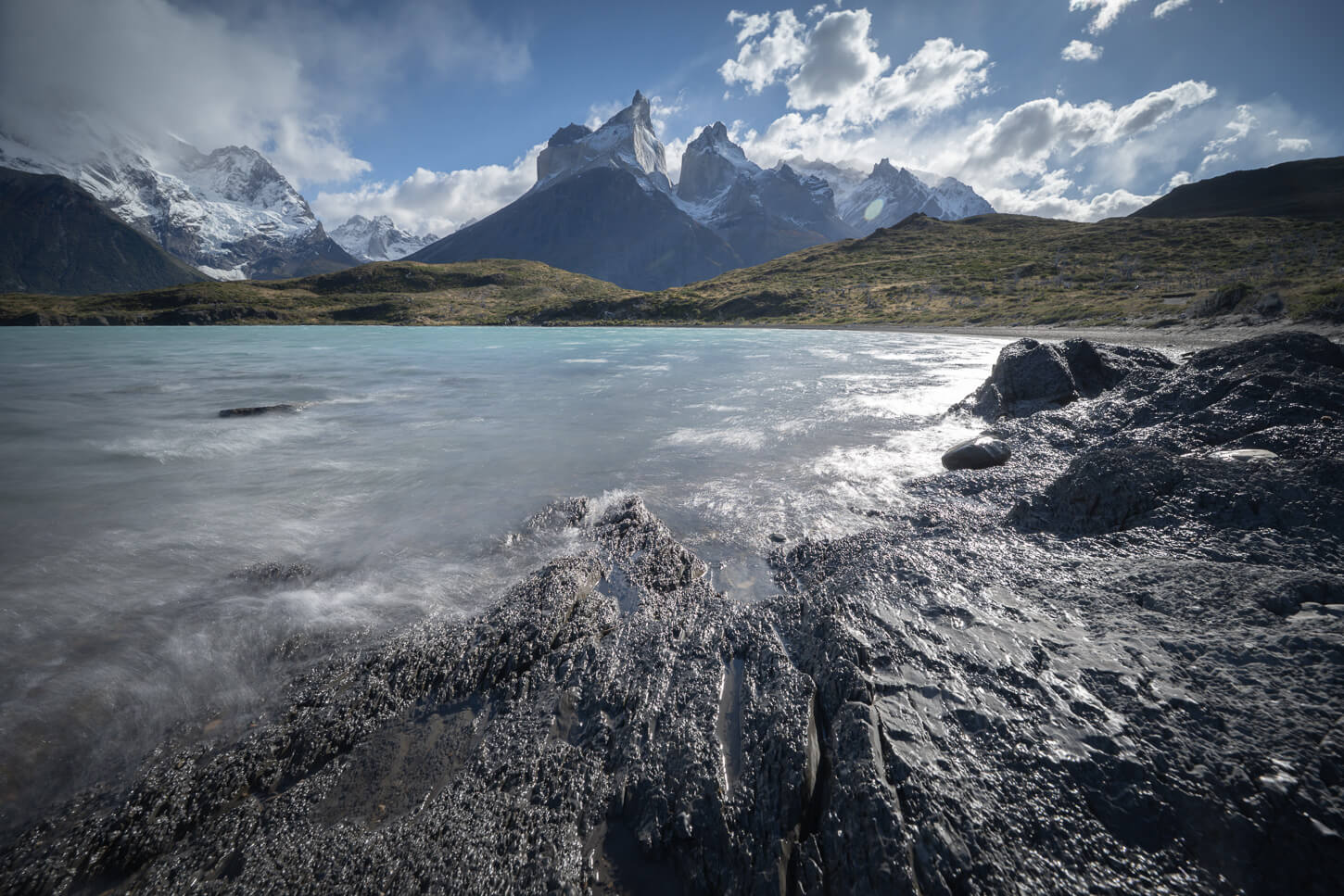 Rocky beach on the shoreline of a lake in Chilean Patagonia