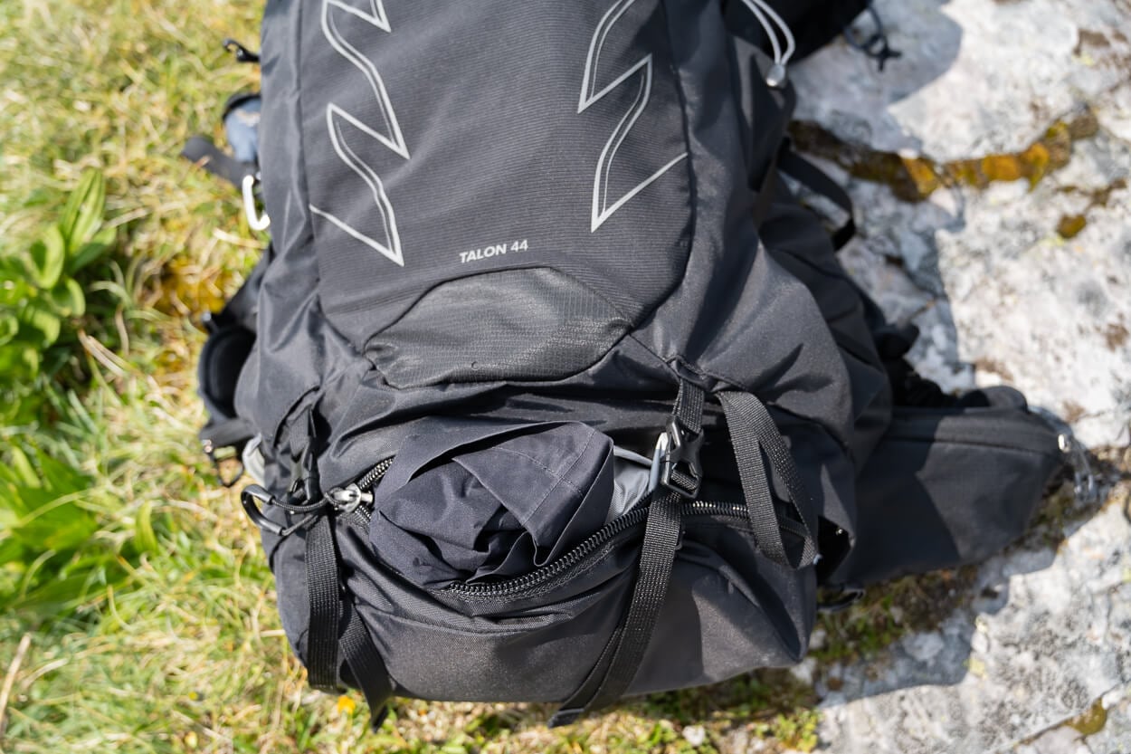 Backpack with a zipper at the bottom to open it.