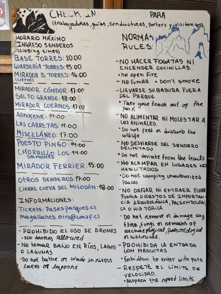 Table showing the rules of the Torres del Paine park and the opening hours of the best hiking trails.