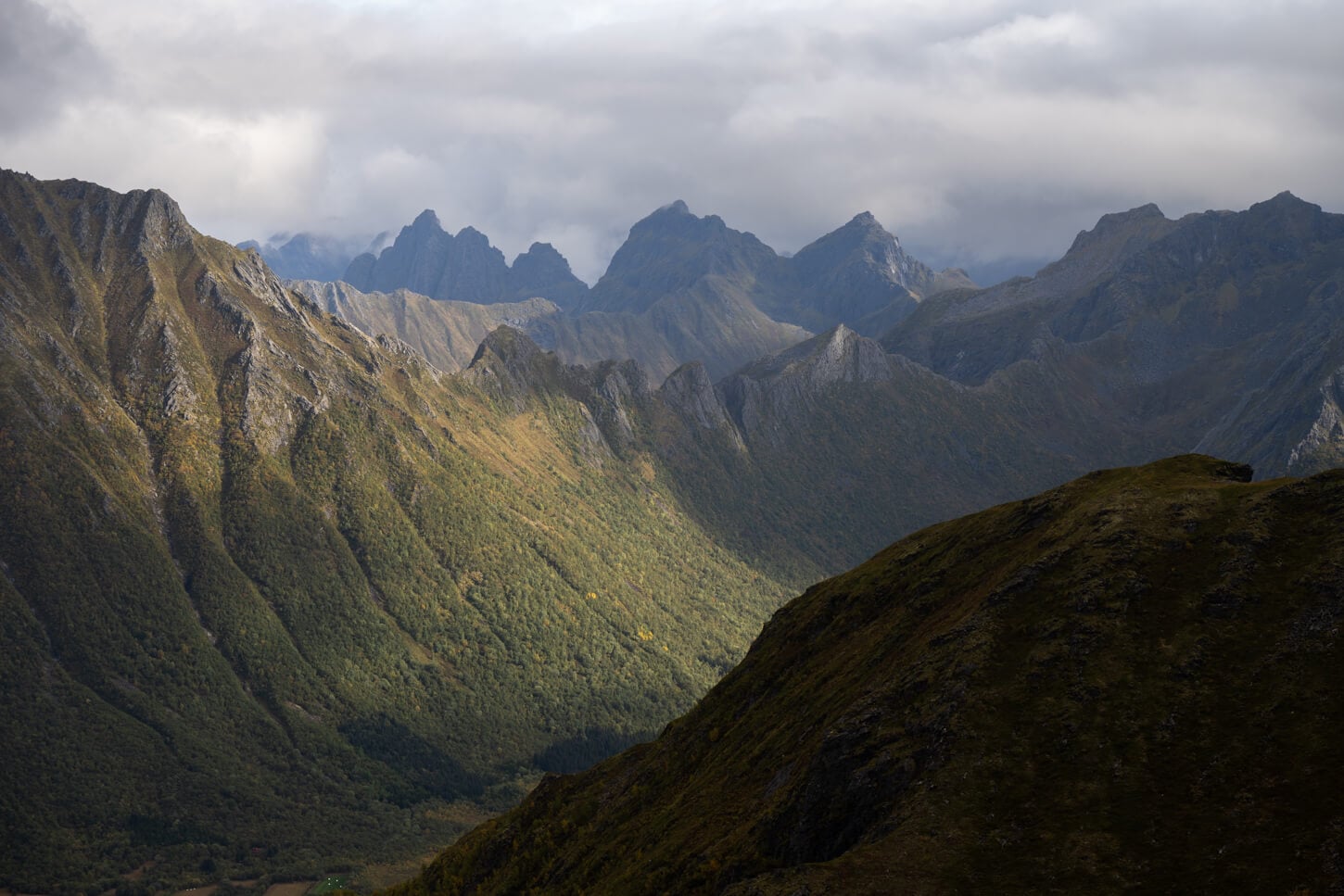 Mountains of the lofoten island under the soft warm light of the morning.