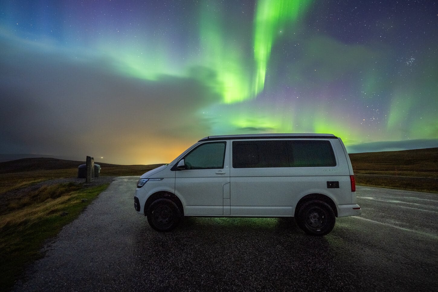 Campervan near north cape under the northern lights