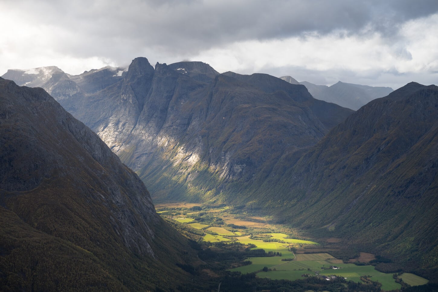 Trollvegen is partly lit by the late afternoon sun.